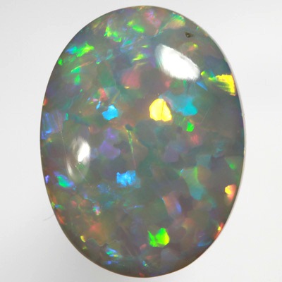 SOLID SEMI BLACK OPAL Bright fire in a rare Jigsaw pattern SEE VIDEO